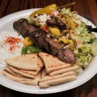 Lamb Kabob Plate · One delicious lamb kabob, plus one side of your choice. Homemade tzatziki and hot pita.