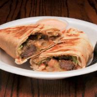 Spicy T Wrap · Gyro meat,rice, tabouli, grilled veggies grilled to perfection. Served with our famous spicy...