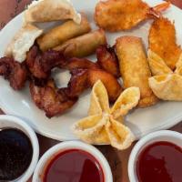 Pao Pao Platter · Starter dish: 2 Crab Rangoons, 2 Spring Rolls, 2 Chicken on Stick, 2 Dumplings, and 2 Fried ...