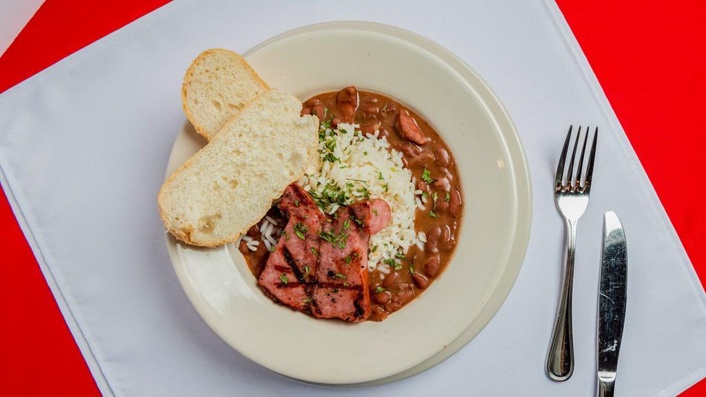 Red Beans & Rice · This Louisiana Favorite Combines Slow Cooked Red Beans & Grilled Smoked Sausage. Served Over Rice.