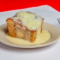 Bread Pudding · A New Orleans Favorite. Baked To A Golden Brown & Topped With A Bourbon Sauce.