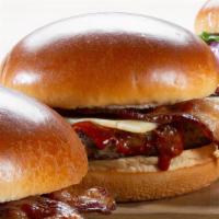 Ragin Cajun Burger · 1/4lb Angus Burger with Blackened Voodoo & Hot Shot, Applewood Bacon & Pepperjack Cheese