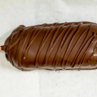 Chocolate Dipped Twinkie · Hostess Twinkie dipped in Milk Chocolate, Dark Chocolate, or White Confection.