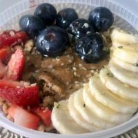 Acai Bowl · Fan Favorite: Açaí sorbet topped with granola, almond butter, bananas, strawberries, blueber...