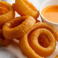 Beer Battered Onion Rings · Thick sliced onion rings, battered, and fried golden brown. Served with allstar sauce.