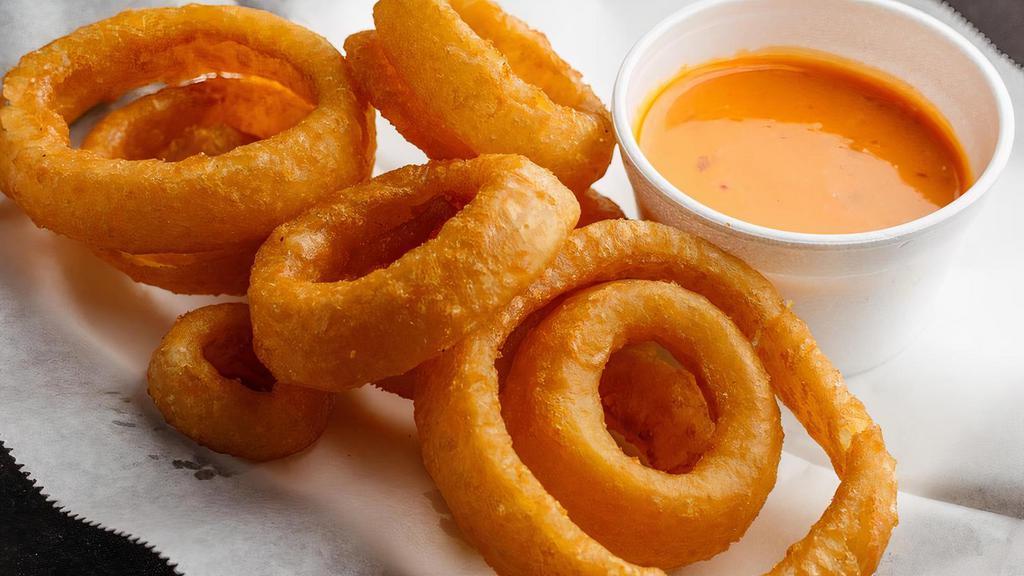 Beer Battered Onion Rings · Thick sliced onion rings, battered, and fried golden brown. Served with allstar sauce.