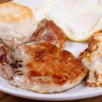 Center-Cut Pork Chop · Served w/ 2 eggs, hash or grits, toast or biscuit. Add 2 pancakes 3.99