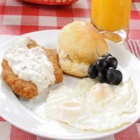 Country Fried Steak · Served w/ 2 eggs, hash or grits, toast or biscuit. Add 2 pancakes 3.99