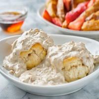 Biscuit & Country Gravy · Two Buttermilk Biscuits smothered in Country Gravy.