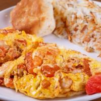 Seafood Omelet · With crawfish, shrimp, cheese, tomato &       mushrooms.  (Comes w/ a bread and side)