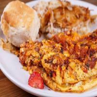 Alligator Omelet · With alligator sausage, cheese, tomato, onion, parsley, paprika & cracked pepper.. (Comes w/...