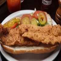 Fried Fish Po'Boy · Dressed w/ lettuce, tomatoes, pickle and onions. Mayo and mustard on side. Add fries, onion ...