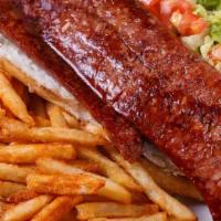 Hot Sausage Po'Boy · Dressed w/ lettuce, tomatoes, pickle and onions. Mayo and mustard on side. Add fries, onion ...