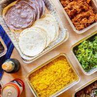 Tinga And Carnitas Tacos (10 Tacos) · Carnitas, Chicke tinga , Beans , rice , Onions, cilantro , Pico de gallo, creama dulce, lett...