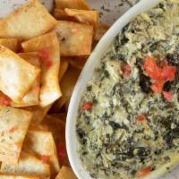 Soule Spinach Dip (4 Oz) · Four ounces serving of vegan spinach dip served with fresh fried tortilla chips.