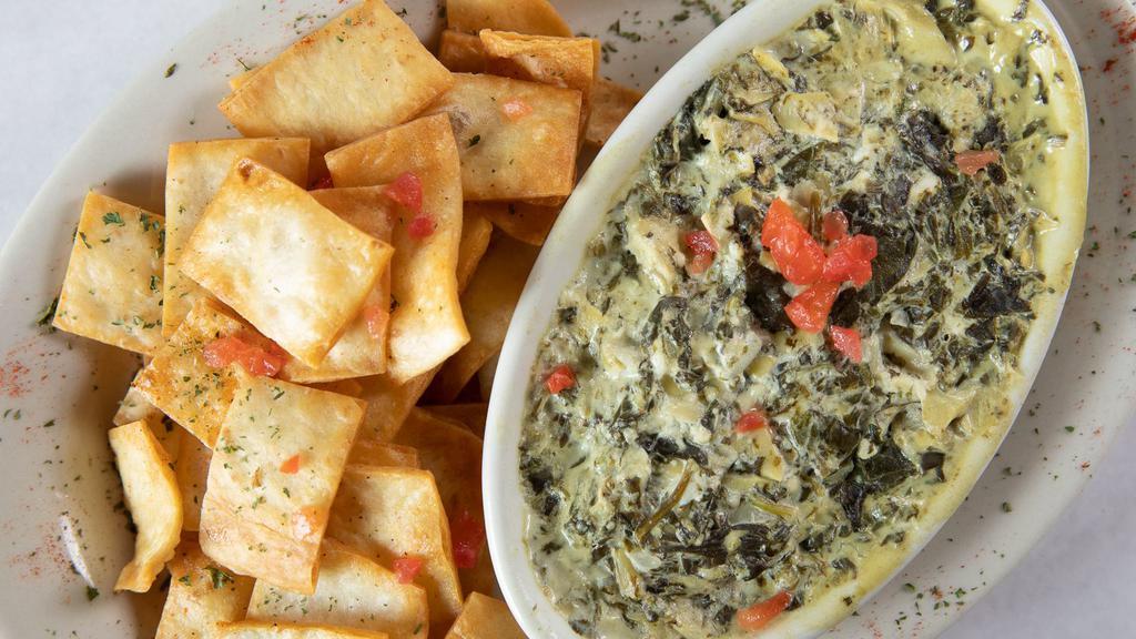 Soule Spinach Dip (4 Oz) · Four ounces serving of vegan spinach dip served with fresh fried tortilla chips.