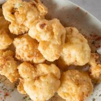 Fried Cauliflower · Lightly battered and golden fried fresh cauliflower.