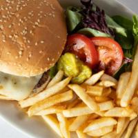 Soule' Burger · Beef burger topped with soule sauce and served with fries.