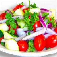 House Salad · Cucumber, cherry tomatoes, parsley, onions, olive oil and black pepper. Available with Itali...