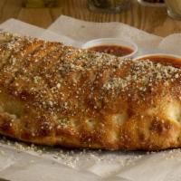 Deluxe Calzone (Regular) · Mozzarella Cheese, Ricotta Cheese, Pepperoni, Sausage, Bell Peppers, Onions, Mushrooms