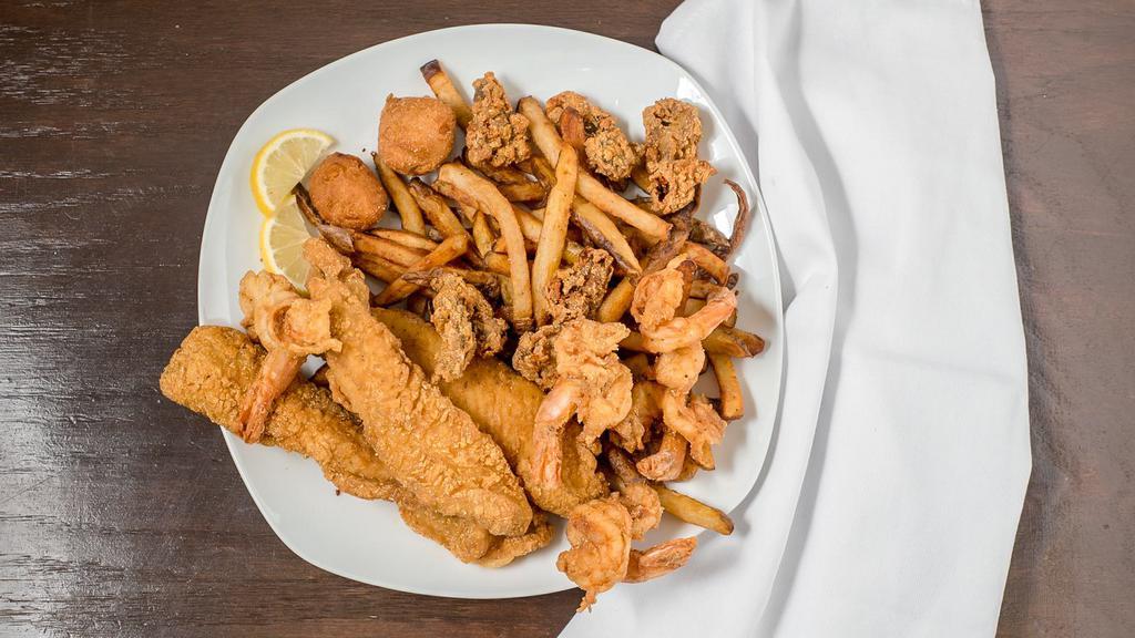 Captain'S Platter · When your appetite demonstrates you are ready to step up to the big league of seafood, try the captain's platter three pieces of whiting fish, four fried or grilled gulf shrimp, four fried oysters and fresh cut fries.