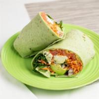 Vegetarian Wrap · Vegan Upon Request. House Hummus, Tomato, Spinach, shredded Carrot, Cucumber, Avocado, Red O...