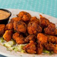 Gator Tail Bites · Marinated white meat gator tail served fried or blackened. Served with remoulade sauce.