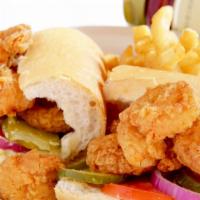 Fried Shrimp Po-Boy · Dressed with tomatoes, pickles, onions. Remoulade and coleslaw.