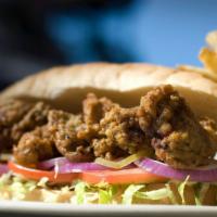 Oyster Po-Boy · Make it buffalo for additional charge dressed with tomatoes, pickles, onions. Remoulade and ...