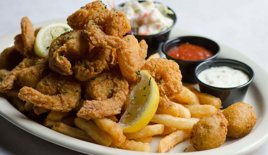 Fried Shrimp Platter · Served with cocktail, tartar, coleslaw, jalapeño hushpuppies, and French fries.