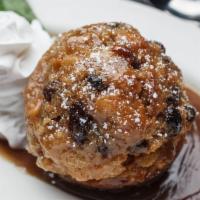 New Orleans Bread Pudding · Served with our famous praline and rum sauce.