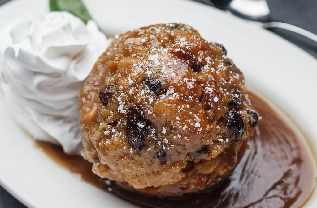 New Orleans Bread Pudding · Served with our famous praline and rum sauce.