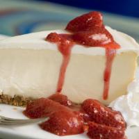 Strawberry Cheesecake · Made daily by our pastry chef, our new York style cheesecake rests on a walnut.
