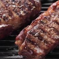 New York Strip 10Oz. · A lean tender cut of beef with slight marbling.[GF] Served with your choice of side, garden ...