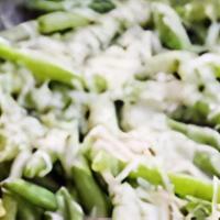 Green Beans · sauteed with oil & garlic. Topped with Parmesan cheese.