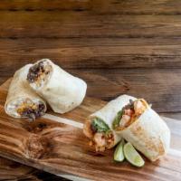 Surf & Turf Burrito · Grilled steak and shrimp, with our chipotle cream sauce, guacamole and rice.