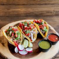 Baja Fish Soft Taco · Battered or grilled fish served with tartar sauce, pico de gallo and lettuce.