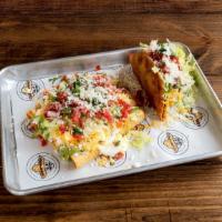 5 Beef Rolled Tacos · Topped with guacamole, shredded cheese and cotija cheese.