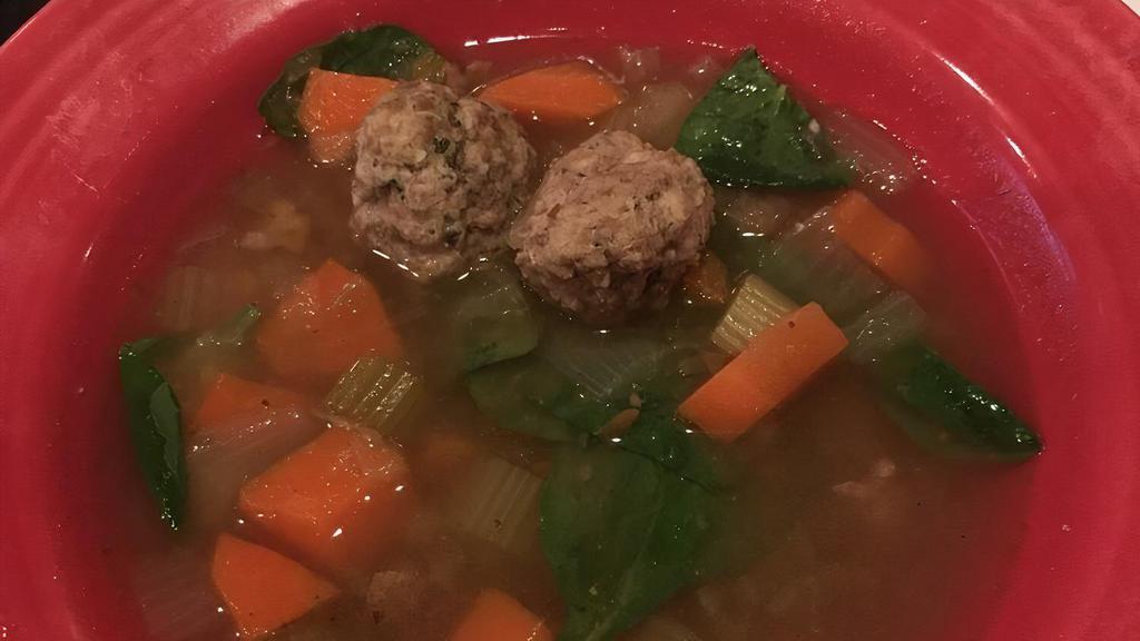 Italian Wedding Soup · A favorite from Mimi's kitchen that marries meatballs, fresh vegetables and acini di pepe pasta.