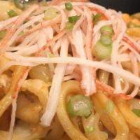 Kimchi Yaki Udon · Japanese thick udon noodles pan-fried with beef, seafood, or chicken, and cabbage in a Korea...