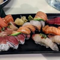 Daiwa Sushi Bridge · 14 pieces of sashimi (tuna, salmon, yellow tail, white fish, crabstick), 8 pieces of sushi (...