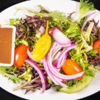 Della Casa · Mixed greens served with cucumber, red onion, cherry tomato, kalamata olive, pepperoncini, a...