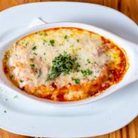 Ziti Al Forno · Baked ziti pasta with mozzarella, parmeggiano, ricotta, san marzano tomato sauce.