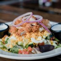 Big Country Fried Chicken Salad · Mixed greens, fried chicken, tomatoes, diced egg, cucumbers, cheddar cheese, croutons and re...