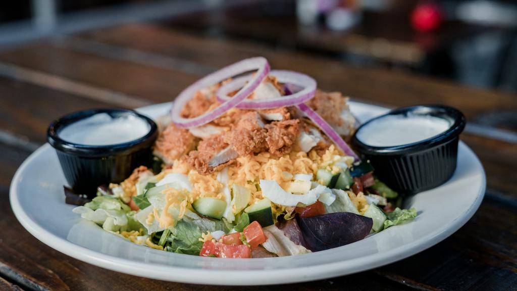 Big Country Fried Chicken Salad · Mixed greens, fried chicken, tomatoes, diced egg, cucumbers, cheddar cheese, croutons and red onion rings.