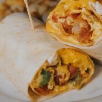 Breakfast Wrap · 2 eggs, 2 bacon, peppers, onions, tomatoes, cheddar w/ homemade potatoes