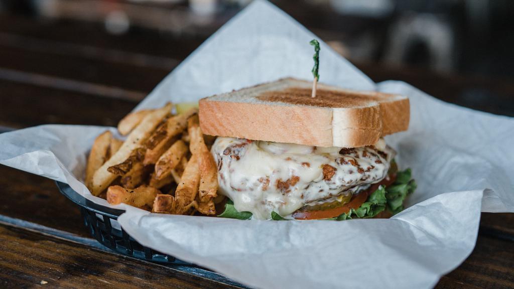 Ranch Chicken Clubhouse Sandwich · Fried chicken breast, lettuce, ranch dressing, crispy bacon and pepper Jack served on Texas toast.