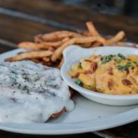 Chicken Fried Steak · Tender beef hand-breaded in a seasoned batter, deep fried to a golden brown and smothered in...