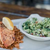 Grilled Salmon · grilled salmon served over spanish rice, seasoned w/ our own signature spice