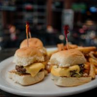 Cheeseburger Sliders · 3 juicy burgers topped with American cheese and pickles on Kings Hawaiian Rolls. Served with...